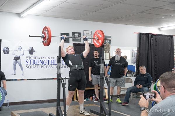 Chase Lindley attempts a 330 lb press