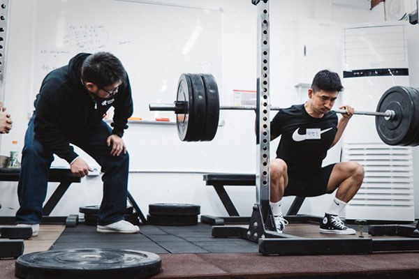 lifter at the bottom of the squat