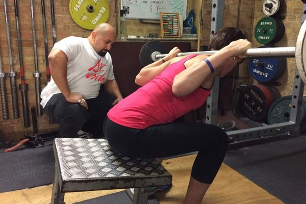 carl raghavan coaches a lifter