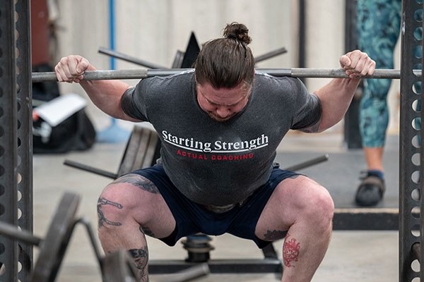 lifter at the bottom of a squat