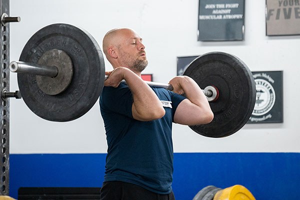 lifter racking a power clean