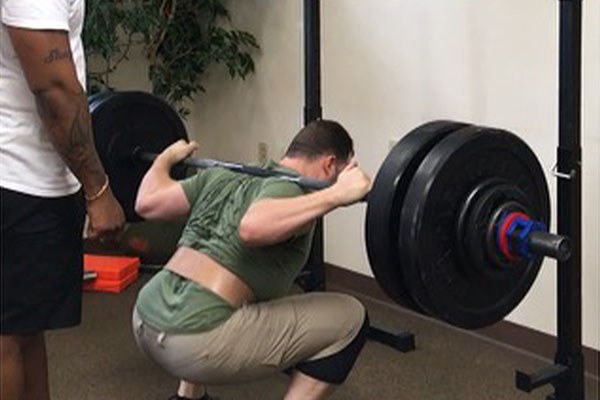 alex pisanello squatting