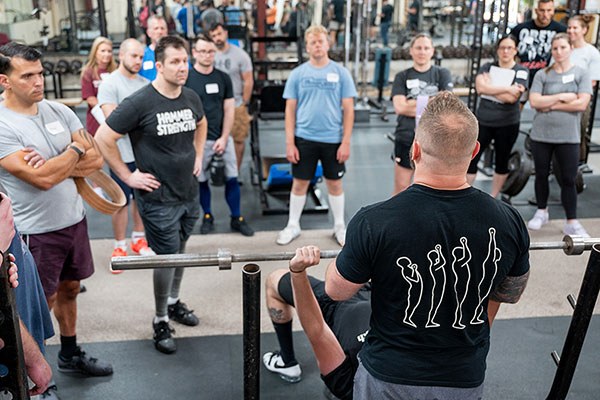 teaching barbell training in a large group