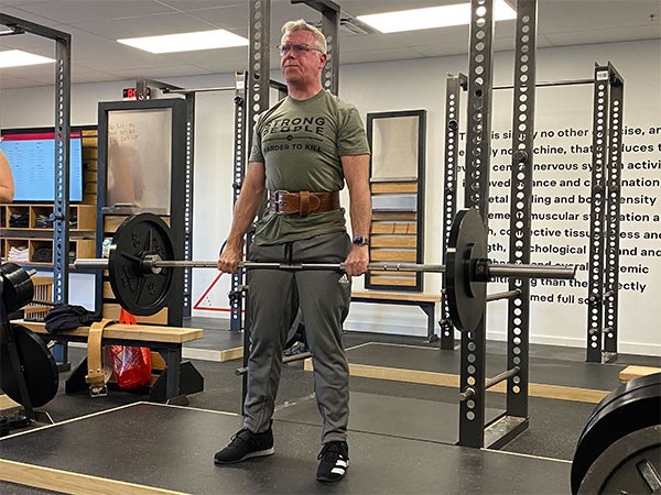 paul thaden deadlifting at starting strength cincinnati in his favorite shirt