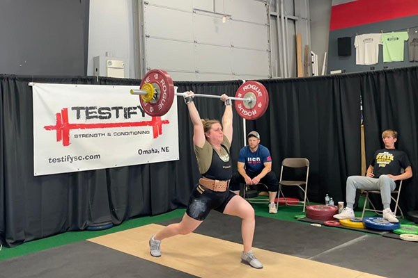 brianne holm racking a jerk on the platform