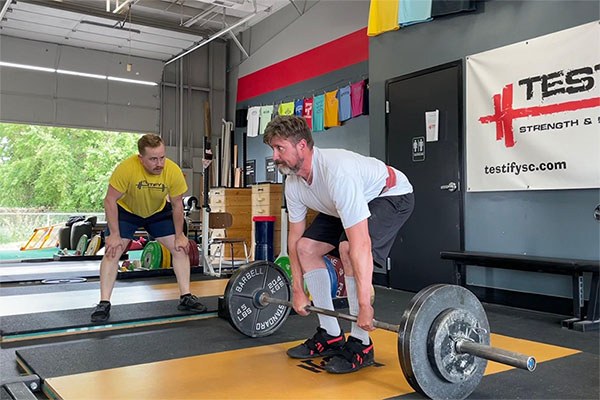 tyler holm coaching the deadlift in omaha