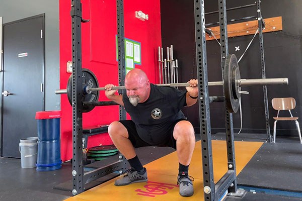 ty squats 155 for five for his third work set