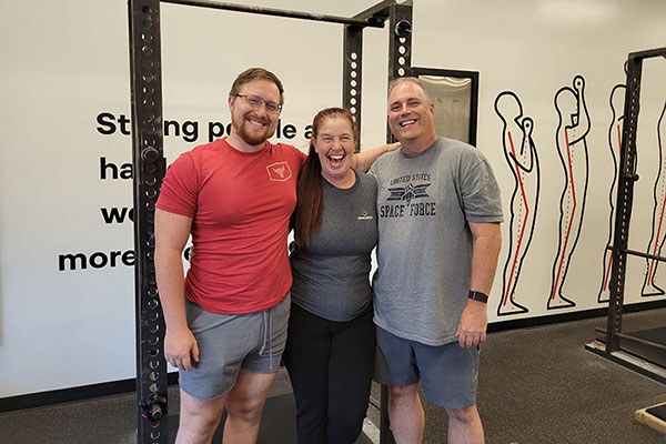 group photo of monroe family that trains at starting strength austin