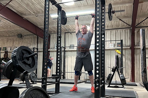 lifter locking out a press