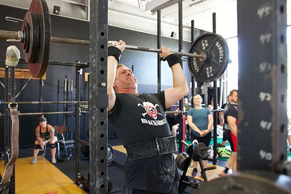 jeremiah presses during ironfest at testify strength and conditioning in omaha nebraska