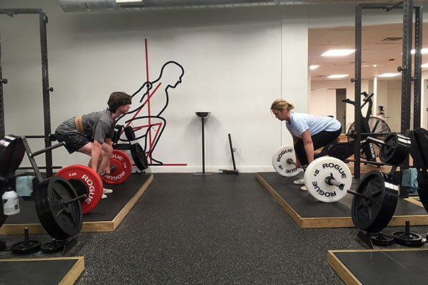 cara and aj learn the deadlift at starting strength boston