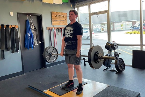 kyam pulls a set of five deadlifts at 260 in his linear progression at testify strength and conditioning