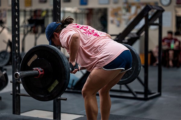 cathy finishes her workout with barbell rows at wfac