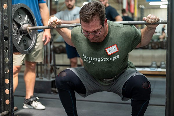 lifter at the bottom of a squat