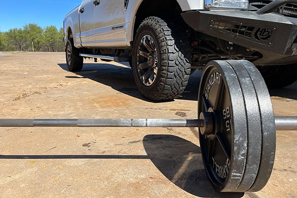 barbell on the ground outside