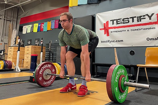 paul taking his christmas prep seriously as he deadlifts in omaha