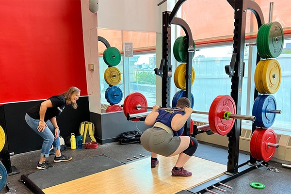 inna koppel coaches molly gingras in the squat