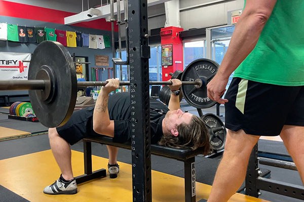 justin drives 150 lb off his chest in the bench press
