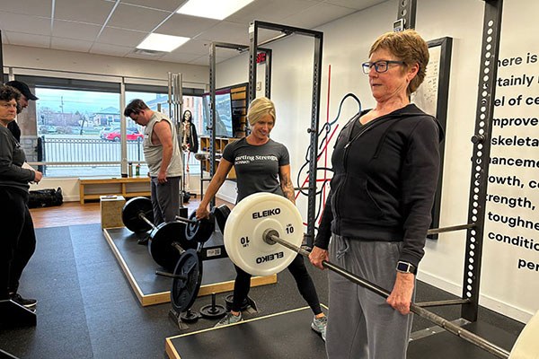 carolyn locks out a deadlift