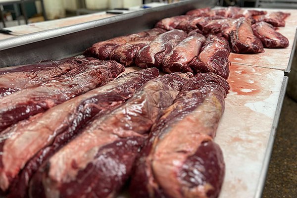 tray of raw red meat