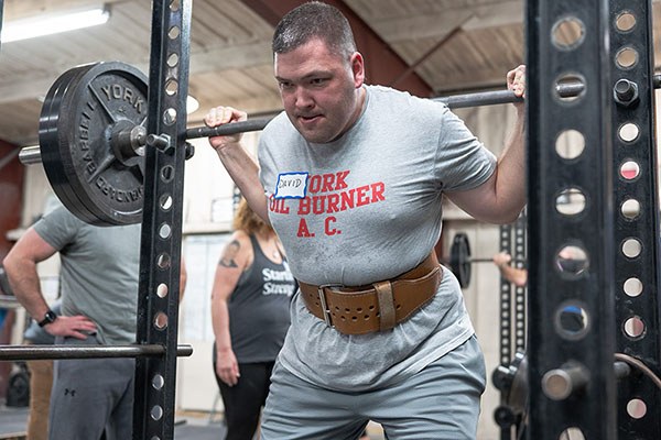 lifter preparing to squat