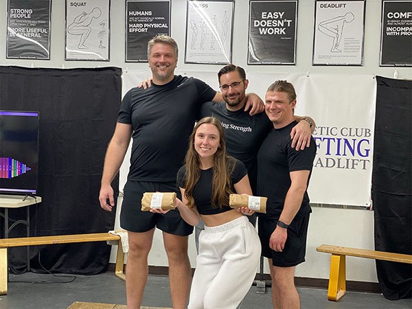 group photo of austin lifters at the wfac strengthlifting meet