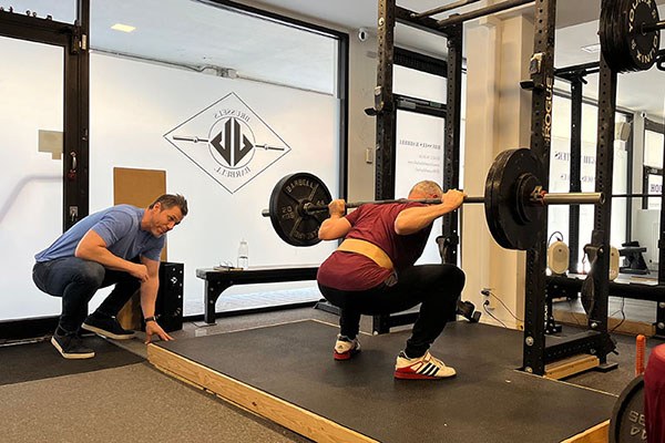 steve ross coaches william during the squat