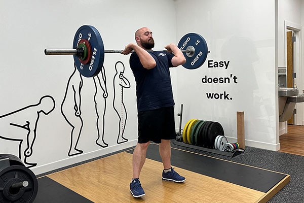 ben recovering after racking a power clean