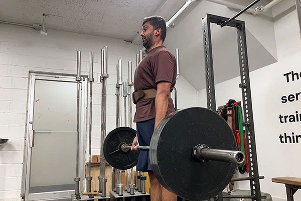 amit locks out a deadlift pr of 315