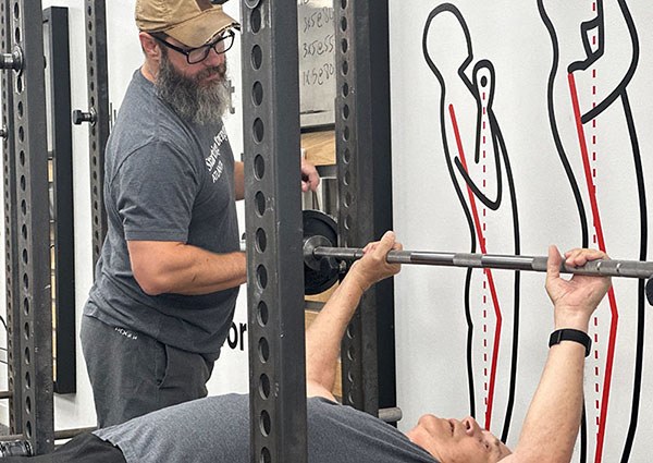 brent coaches the grip on the bench press