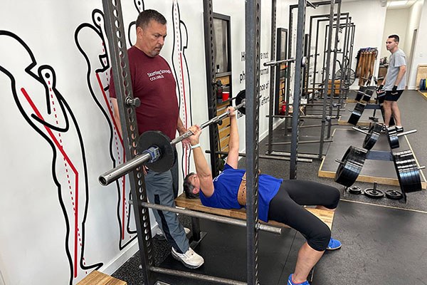 lynn trains volume bench presses