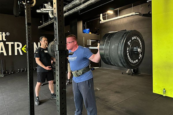 terry after walking out his squat at a starting strength training camp