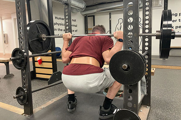 brian at the bottom of 225 squat