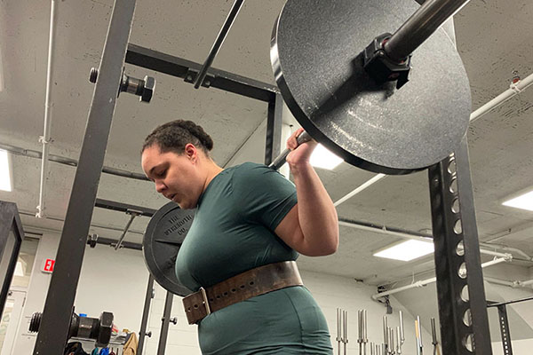 sarah at the top of the squat