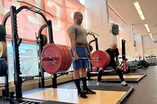 john locks out a 315 deadlift
