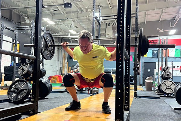 john at the bottom of a pause squat