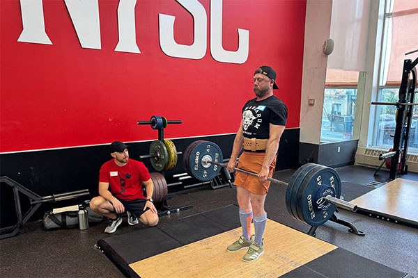 mike locks out a 315 deadlift