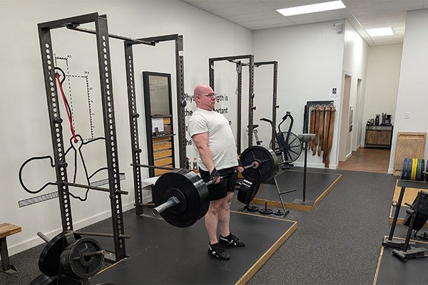 dennis with a pr set of 5 deadlifts