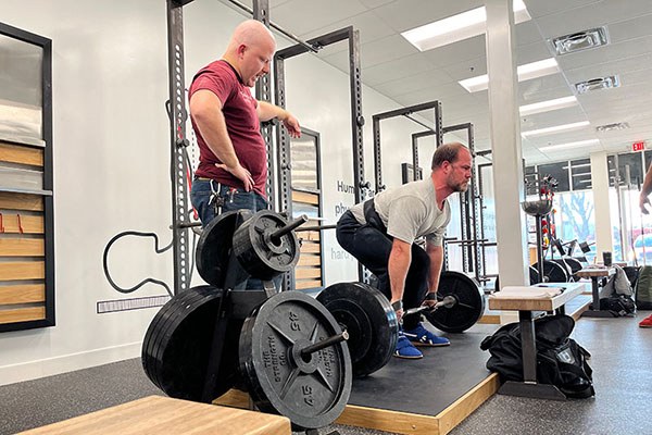 a lifter sets up the start of a deadlift