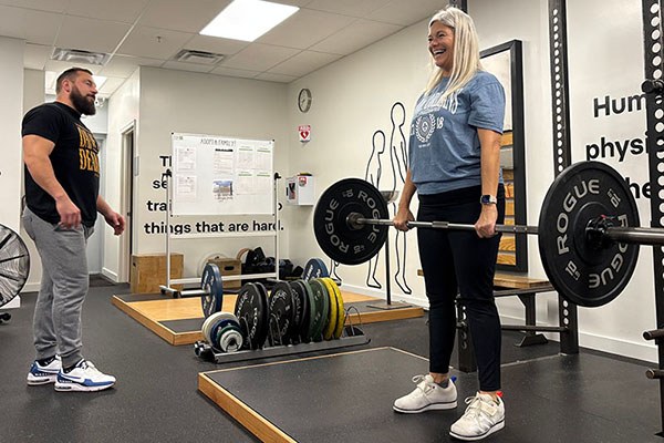 madison locking out a deadlift during her first lifting day