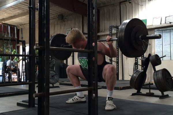 chase at the bottom of a squat