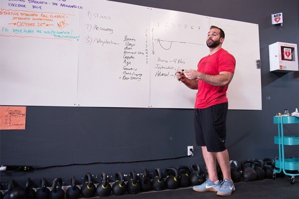 Jordan Feigenbaum lectures at a seminar