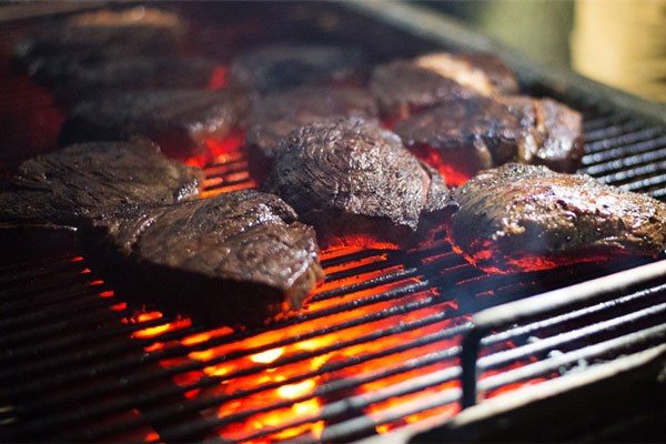 beef steaks on the grill