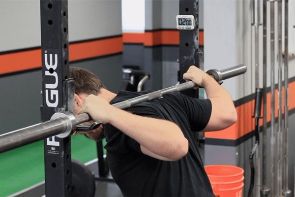 paul horn demonstrates a low bar stretch