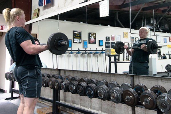 working the dumbbell rack