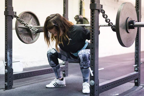 Jill squats 140 for 3 sets of 5 in her linear progression