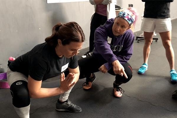 Nikki Burman coaches the squat teaching method