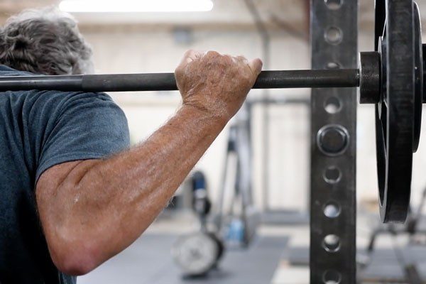 older guy under the bar