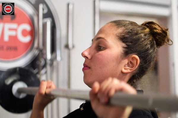 mozelle training the barbell press