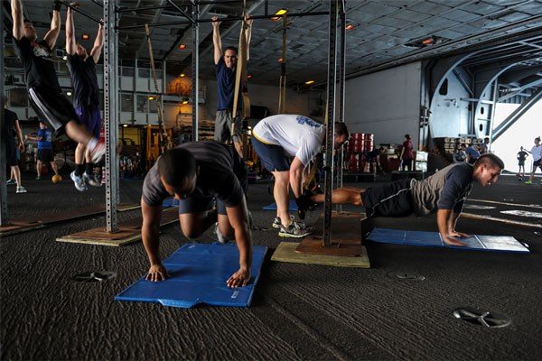 exercise room filled with exercisers